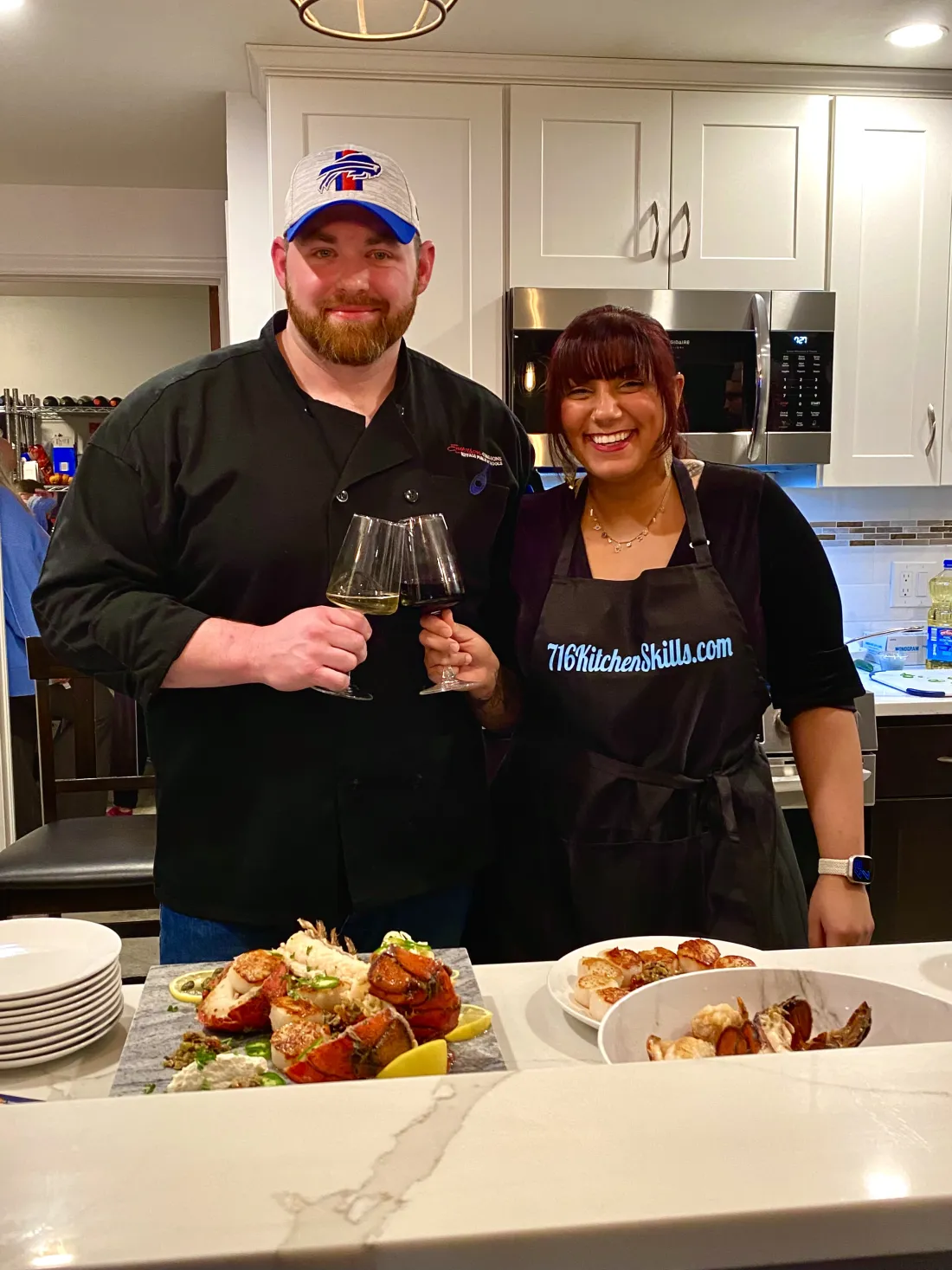 Chef Michael raising a glass with a guest