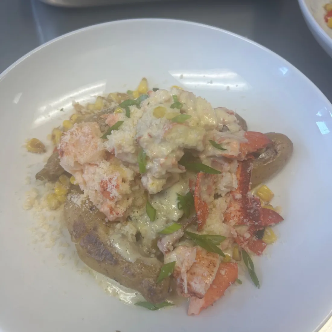 Lobster Hash &mdash; Duck-fat fingerlings, sweet corn succotash, butter-poached claw